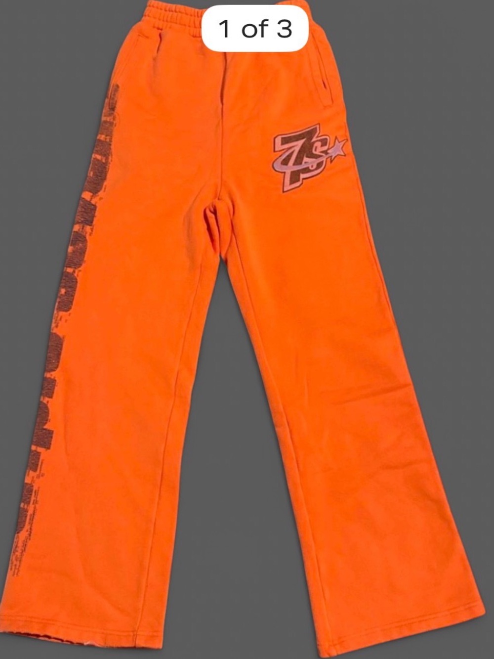 Triple 7s Sevens Vibrant Orange Graphic Sweatpants